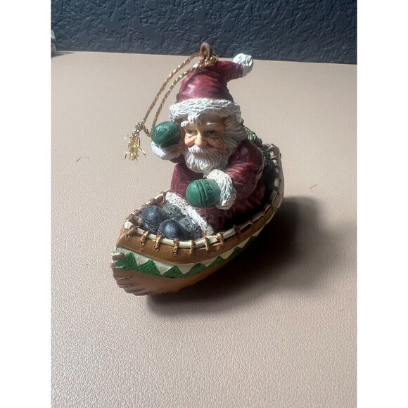 Vintage House of Llyod Christmas Around The World Santa In Canoe Figurine Decor - Picture 1 of 6